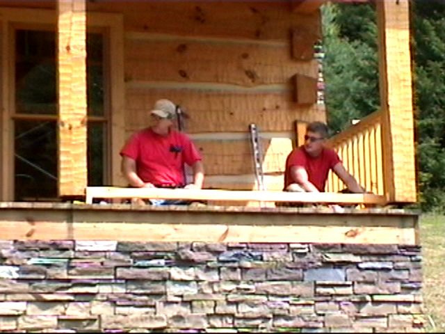 {Dad and Chris on porch}